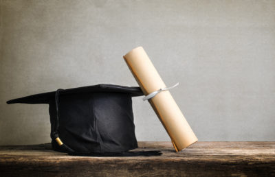 graduation cap and college degree