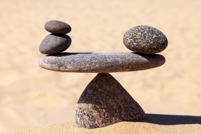 Symbolic scale of the stones. Concept of harmony and balance. work-life, emotional balance.