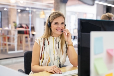 Smiling woman call center agent