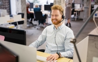 Happy man talking over phone stock photo