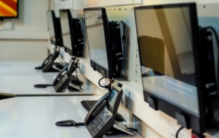 line of phones and computer monitors