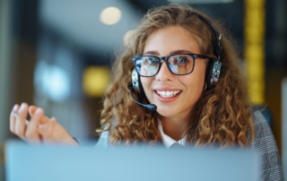 a person wearing a headset working in a spanish call center