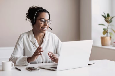 a call center agent delivering inbound call center services to a client