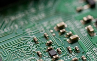 a circuit board representing our CX guide for technology companies.
