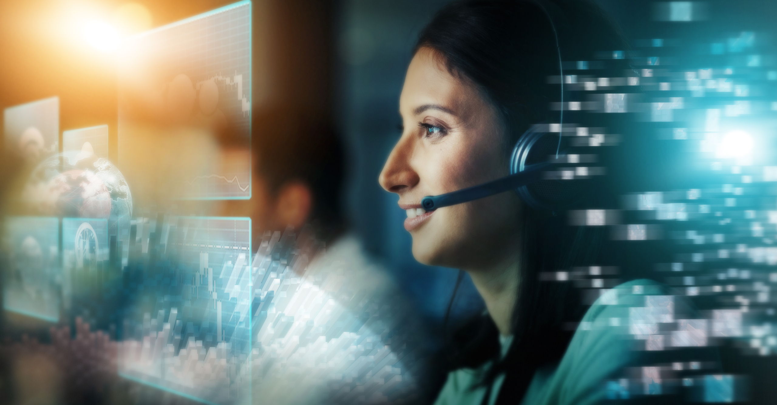 A call center agent uses speech analytics through a futuristic heads up display to aid in answering a customer’s question.