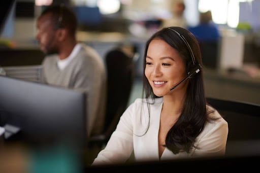 A contact center agent provides quality customer service to a customer on an incoming call.