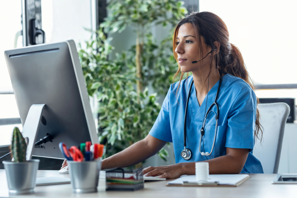 Healthcare call center agent on her computer