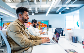 Help desk solution agents on the phone providing customer service.