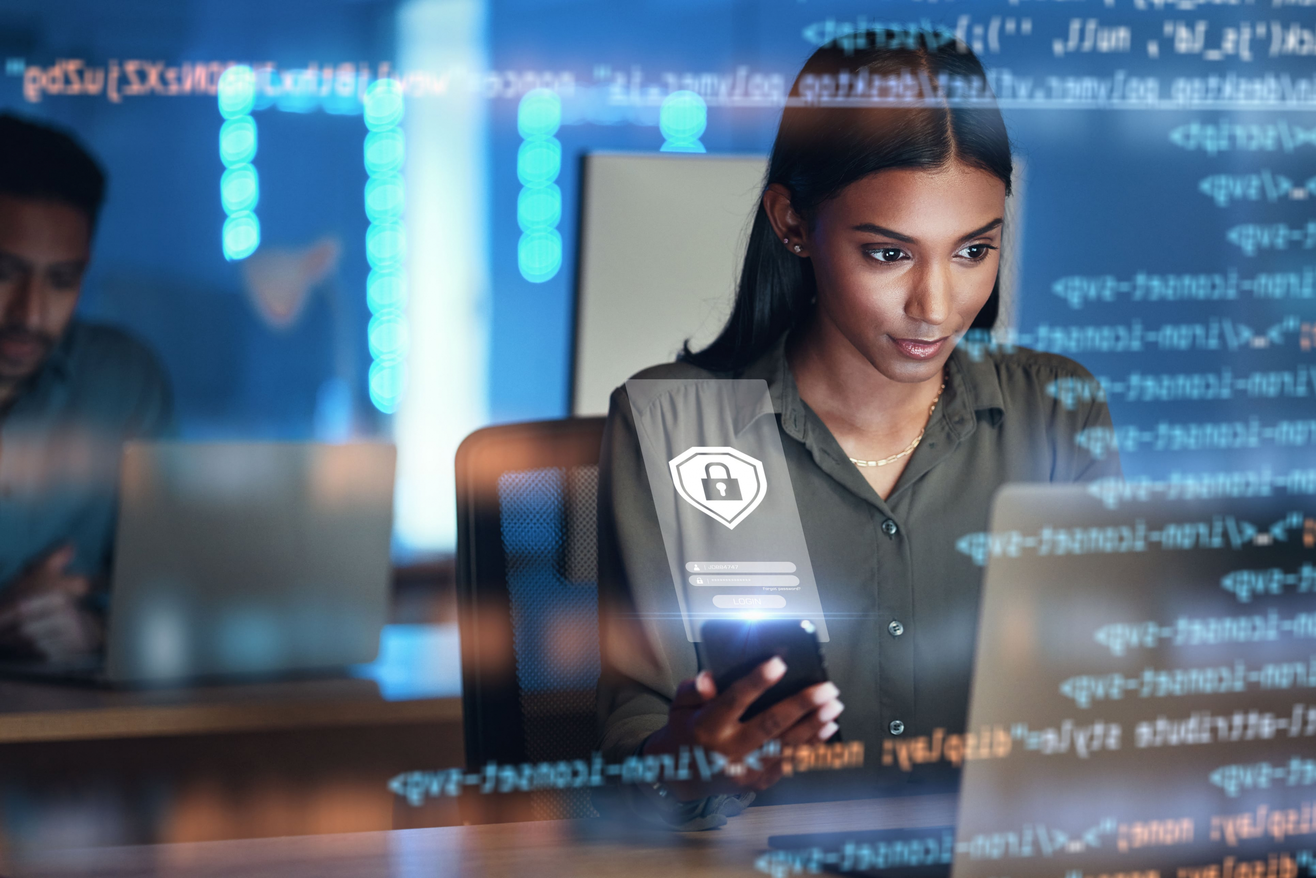 A technical support agent working at a computer.