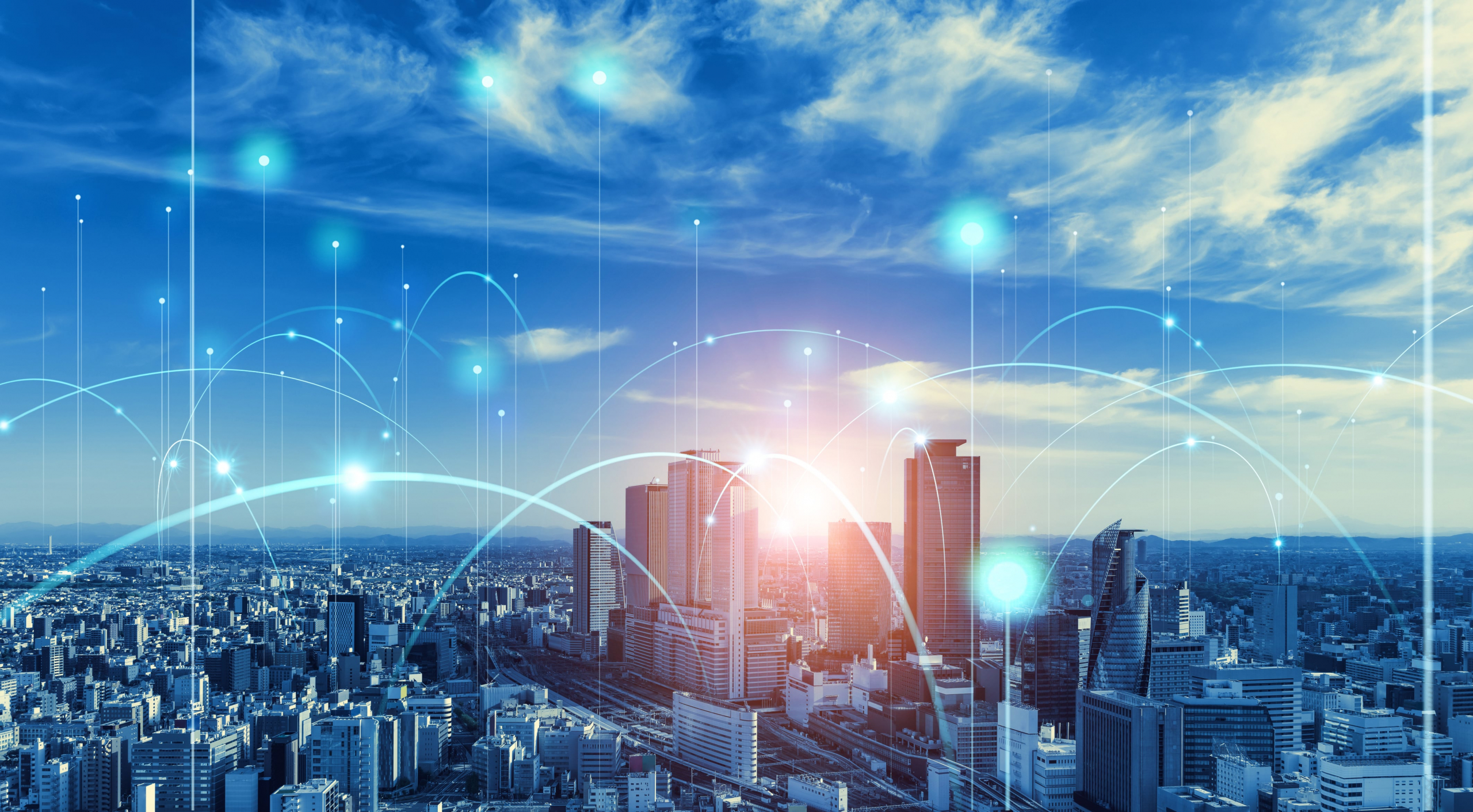 Enterprise buildings with illustrations of wireless connections and calls for illustrative purposes.