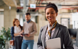 female african american licensed insurance agent smiling