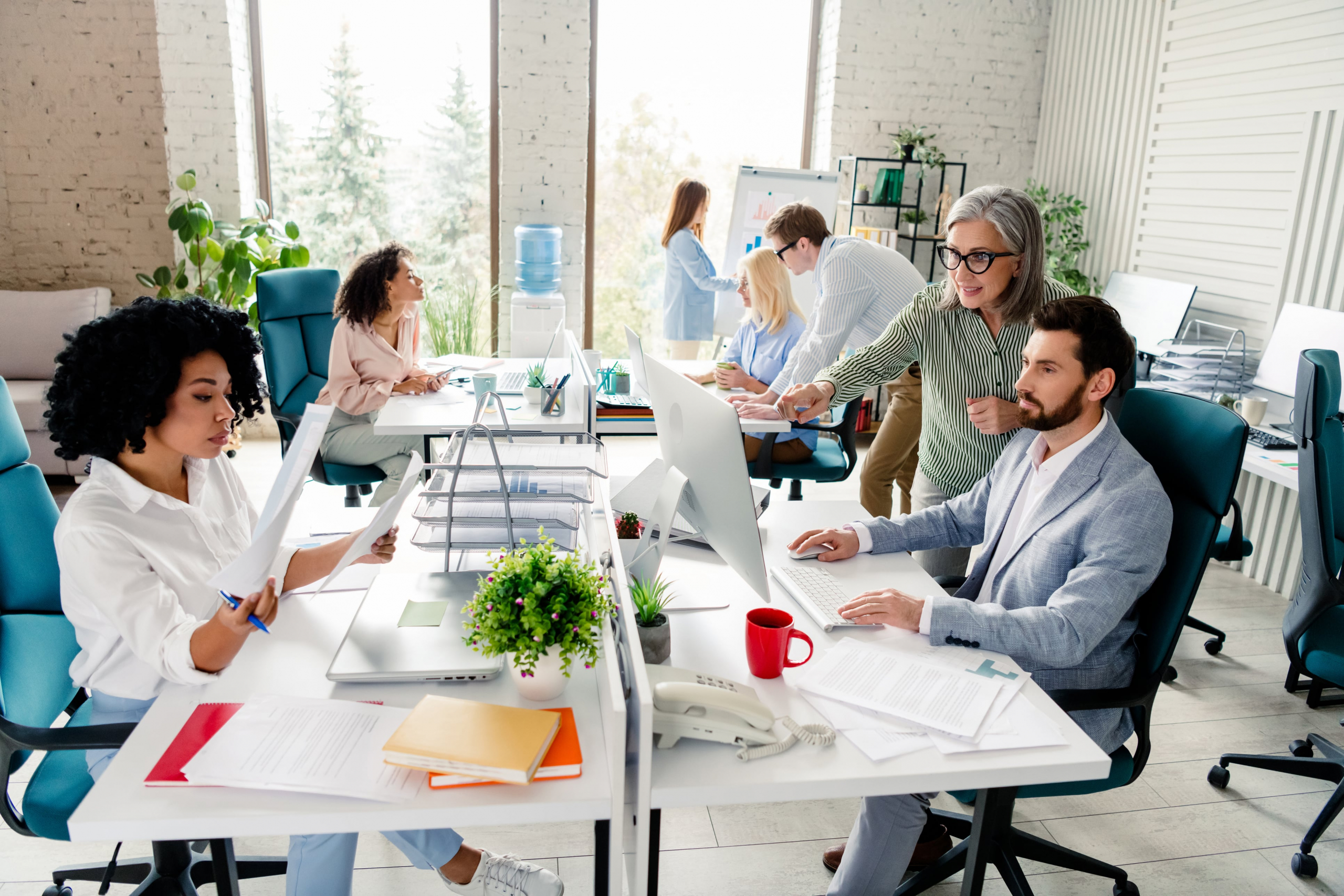 group of young office workers in a modern office
