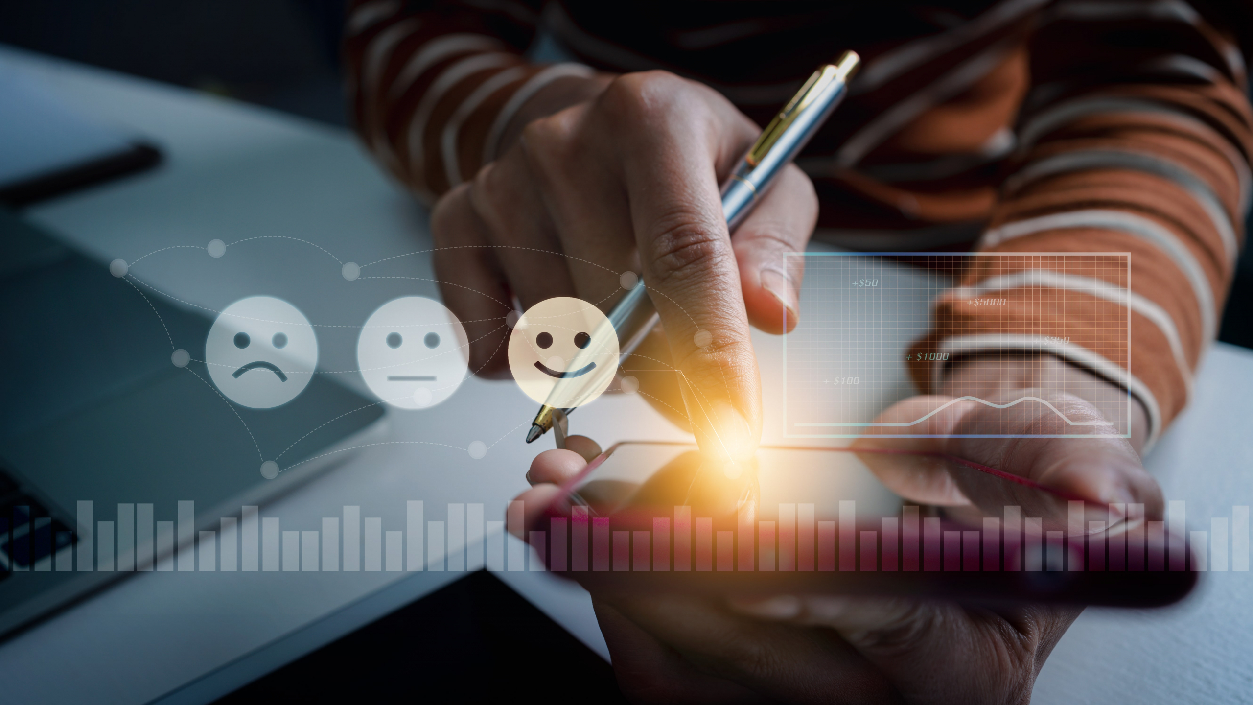 A customer experience management worker with a virtual image of smiley faces selecting their experience level.